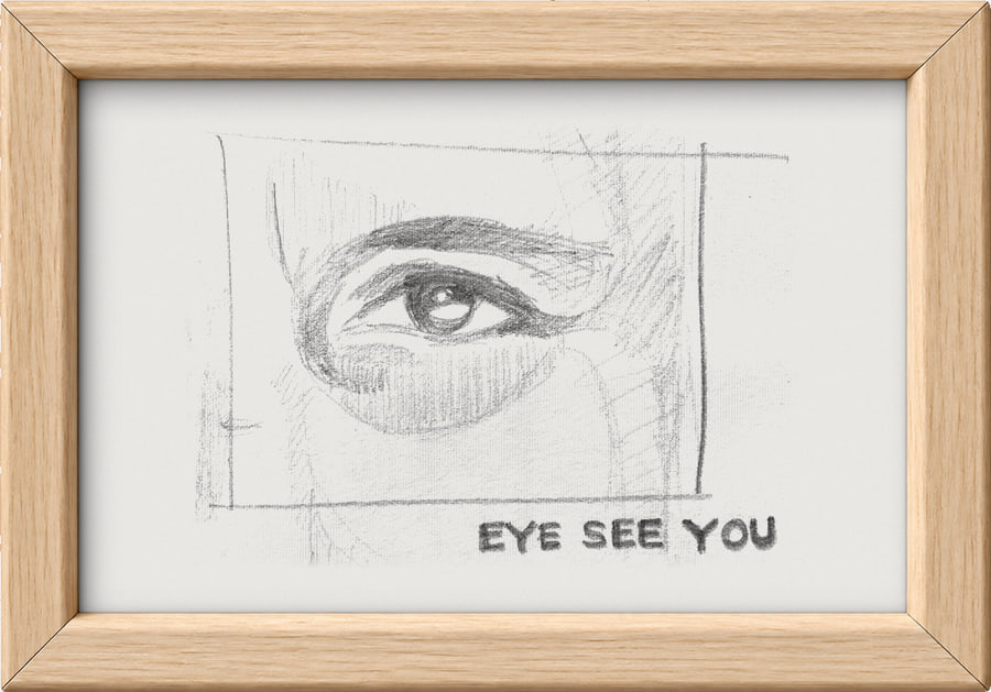 A pencil drawing of an eye, lettered Eye see you, in a light oak frame.